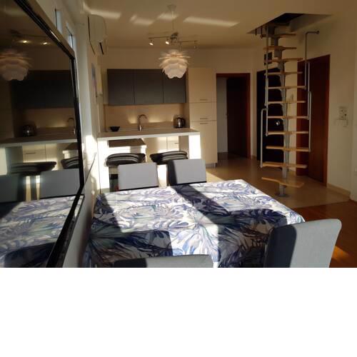 A peaceful two floor apartment with a sea view