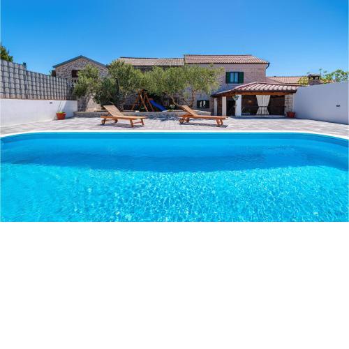Amazing home in Drage with Outdoor swimming pool and 4 Bedrooms