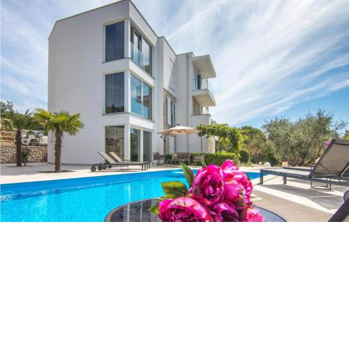 Amazing home in Krk with 8 Bedrooms