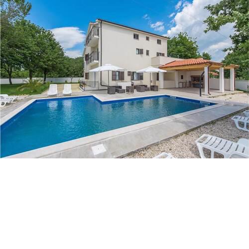 Amazing home in Susnjici with Outdoor swimming pool, WiFi and 9 Bedrooms
