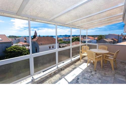 Apartment in Pakostane with sea view, terrace, air conditioning, WiFi 3475-4