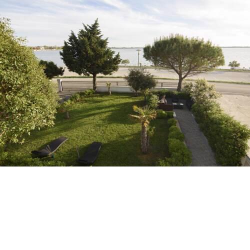 Apartments Tramontana 1st row to beach, private parking