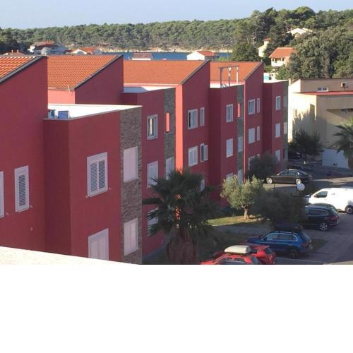 Apartments with a parking space Palit, Rab - 18900