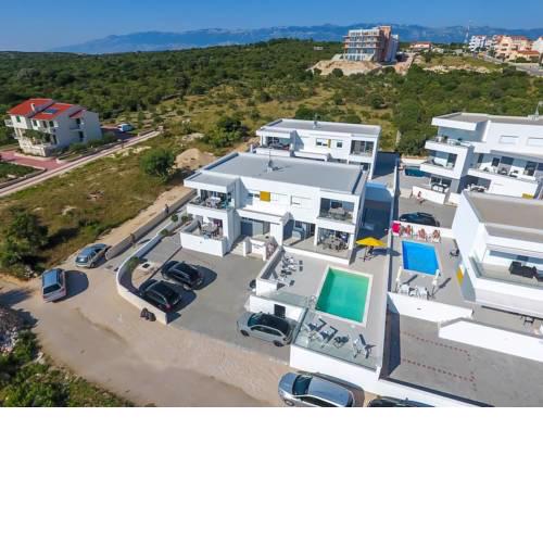 Apartments with a swimming pool Novalja, Pag - 17226