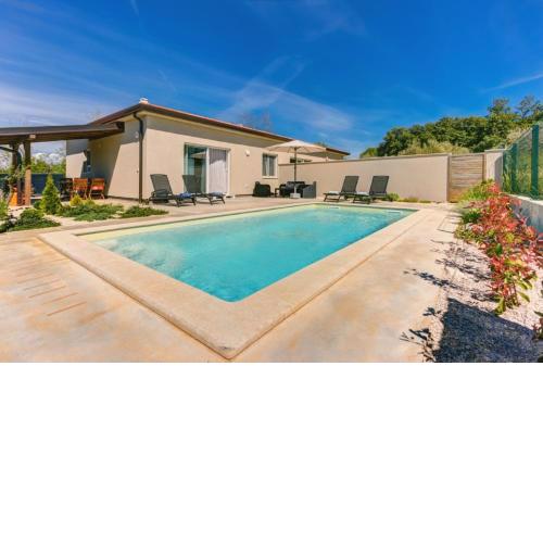 App Eja with pool and sea view