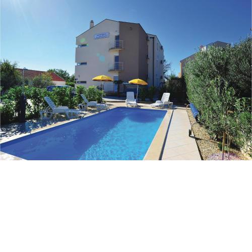 Awesome apartment in Bibinje with Outdoor swimming pool, WiFi and 2 Bedrooms