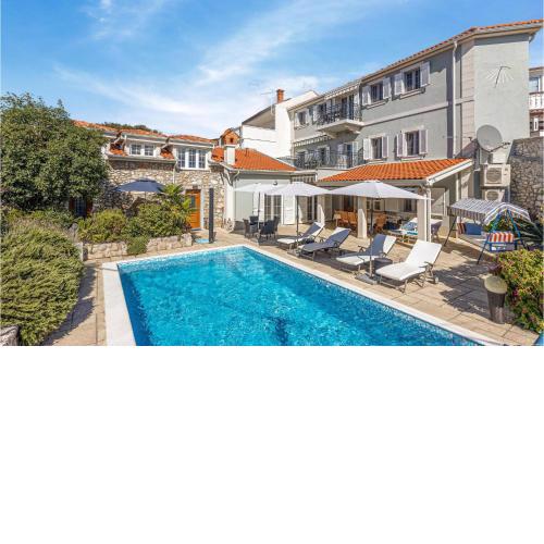 Awesome apartment in Novi Vinodolski with Outdoor swimming pool and 1 Bedrooms