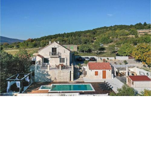 Awesome home in Lovrec with Outdoor swimming pool, Sauna and 4 Bedrooms