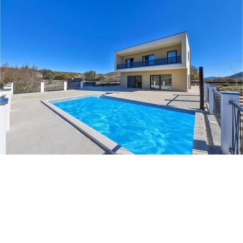 Awesome home in Primorski Dolac with Sauna and 4 Bedrooms