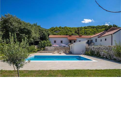 Awesome home in Tribalj with Outdoor swimming pool, WiFi and 4 Bedrooms