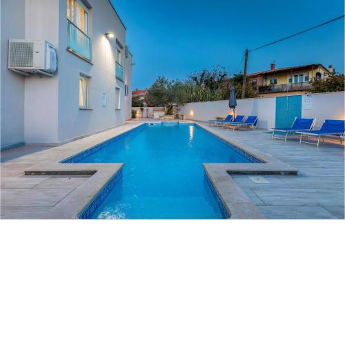 Awesome home in Umag with 8 Bedrooms