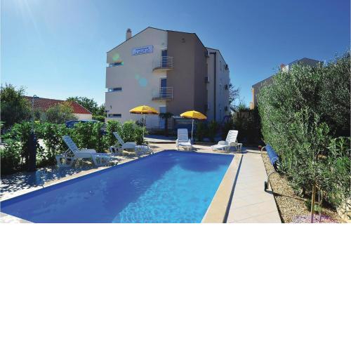 Beautiful apartment in Bibinje with Outdoor swimming pool, WiFi and 1 Bedrooms