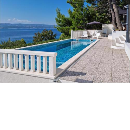 Beautiful apartment in Lokva Rogoznica with WiFi, Heated swimming pool and 2 Bedrooms