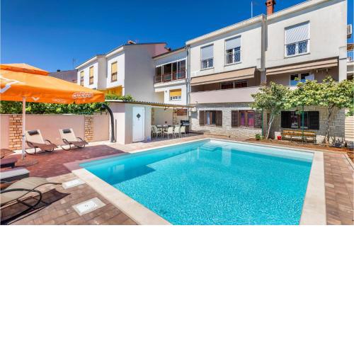 Beautiful apartment in Pula with Outdoor swimming pool, WiFi and 4 Bedrooms