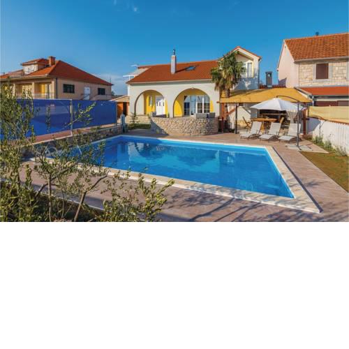 Beautiful home in Oklaj w/ Outdoor swimming pool, Outdoor swimming pool and 2 Bedrooms