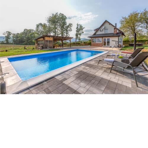 Beautiful home in Smiljan with Outdoor swimming pool, Sauna and 2 Bedrooms