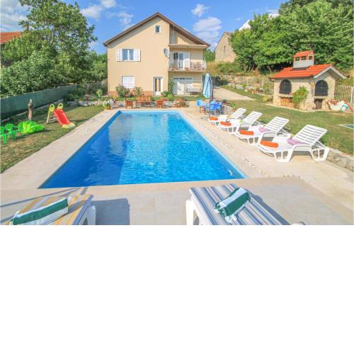 Beautiful home in Suhac with Outdoor swimming pool, WiFi and 4 Bedrooms