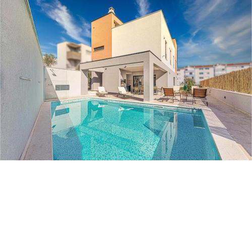 Beautiful home in Trogir with Outdoor swimming pool and 4 Bedrooms
