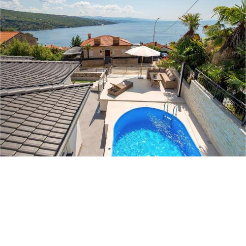 Beautiful home in Volosko with Outdoor swimming pool, WiFi and 2 Bedrooms