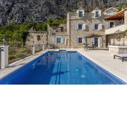ctom291-Breathtaking stone home in the mountain with sea views and private heated Infinity pool