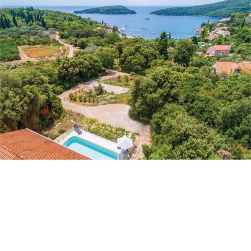 Eight-Bedroom Holiday Home in Molunat