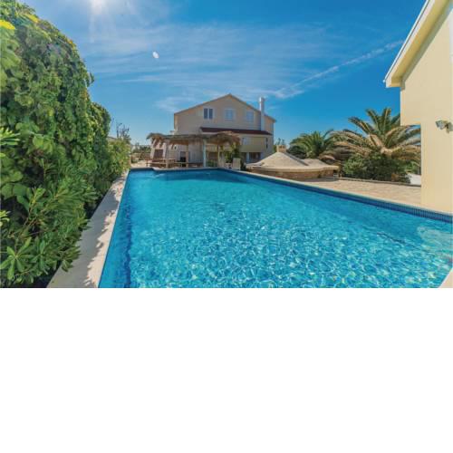 Eight-Bedroom Holiday home Kosljun with Sea View 01
