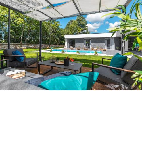Exclusive villa with wellness quietly located offers views of green landscape