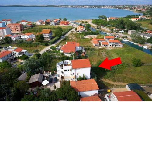 Family friendly apartments with a swimming pool Nin, Zadar - 5858
