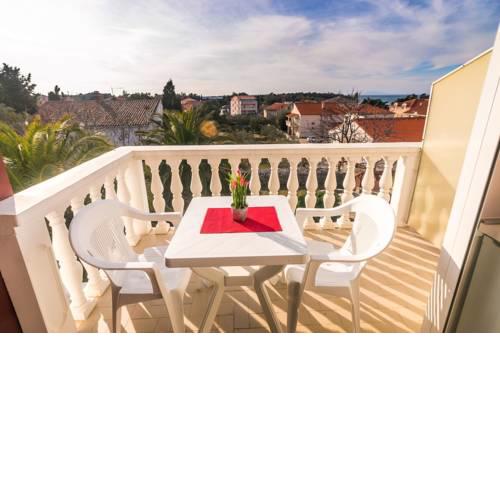 Family friendly apartments with a swimming pool Novalja, Pag - 17051