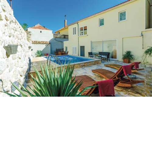 Five-Bedroom Holiday Home in Drvenik