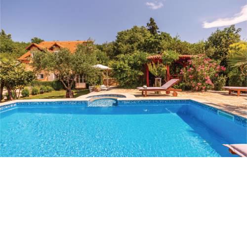 Five-Bedroom Holiday Home in Zmijavci