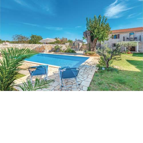 Four-Bedroom Holiday Home in Fabci