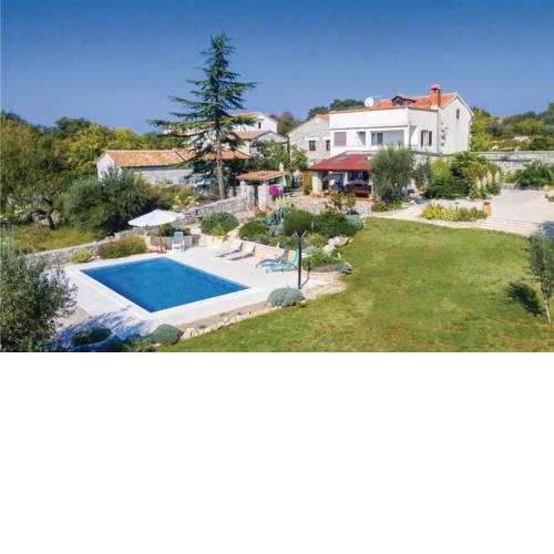Four-Bedroom Holiday Home in Jural