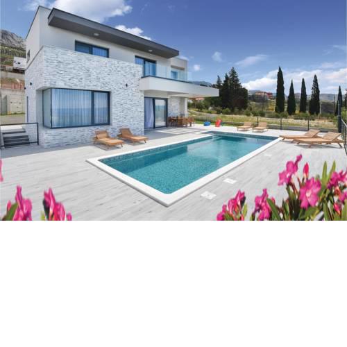 Four-Bedroom Holiday Home in Kucine