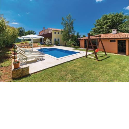 Four-Bedroom Holiday Home in Loborika