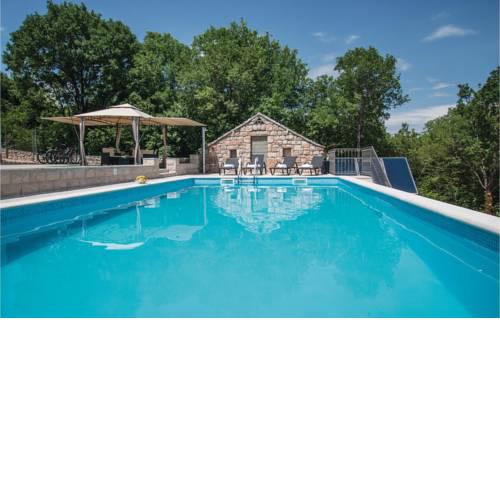Four-Bedroom Holiday Home in Lokvicici