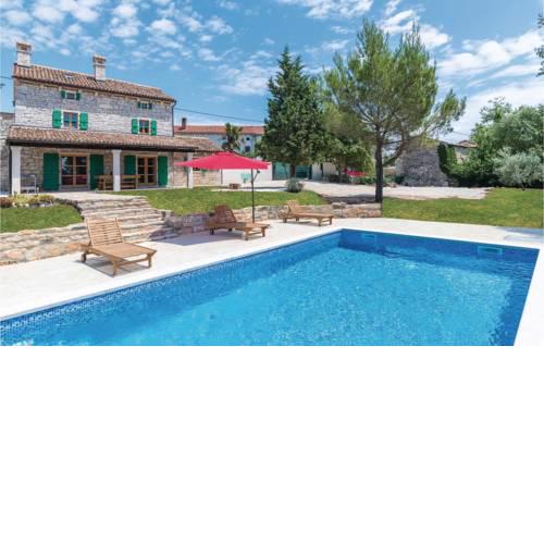 Four-Bedroom Holiday Home in Marcana