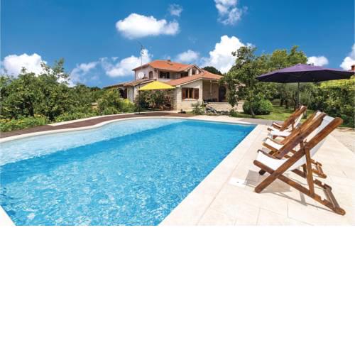 Four-Bedroom Holiday Home in Marcana