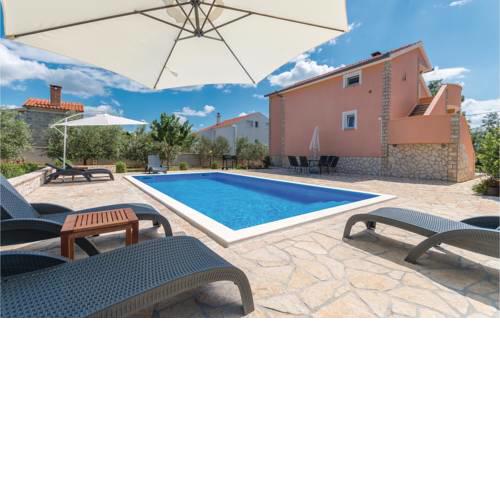 Four-Bedroom Holiday Home in Miranje