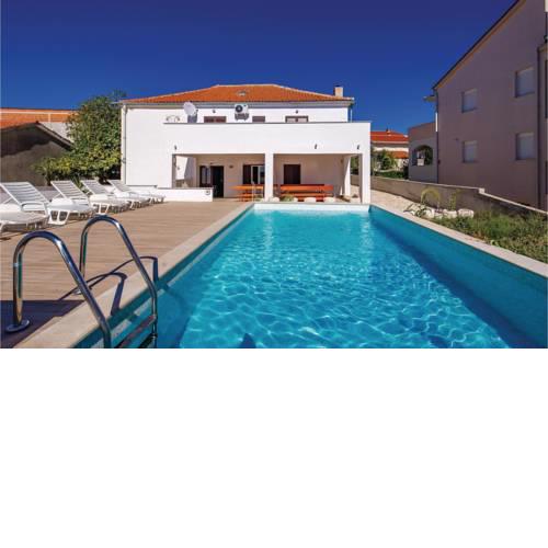 Four-Bedroom Holiday Home in Novalja