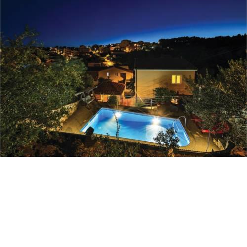 Four-Bedroom Holiday Home in Okrug Gornji