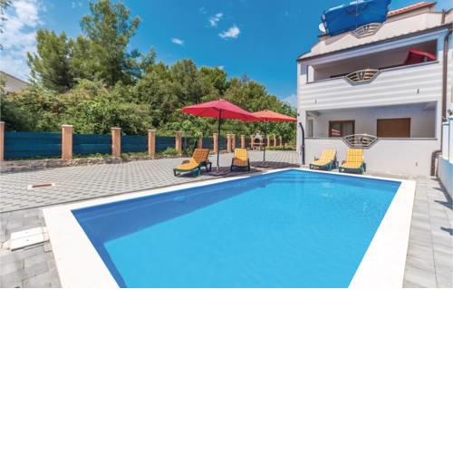 Four-Bedroom Holiday Home in Pakostane