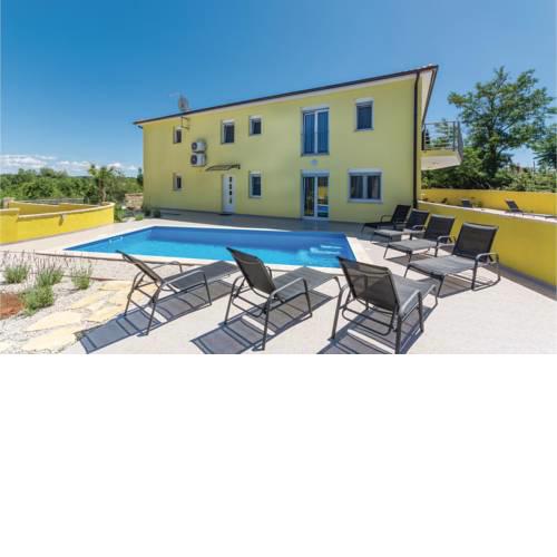 Four-Bedroom Holiday Home in Perci