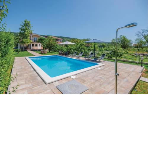 Four-Bedroom Holiday Home in Prolozac Donji