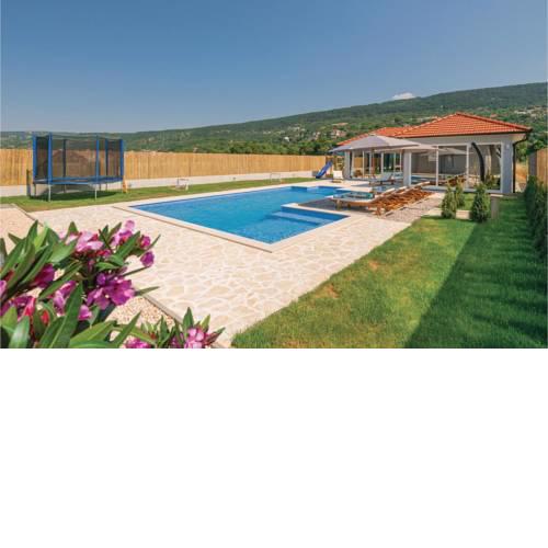 Four-Bedroom Holiday Home in Prolozac