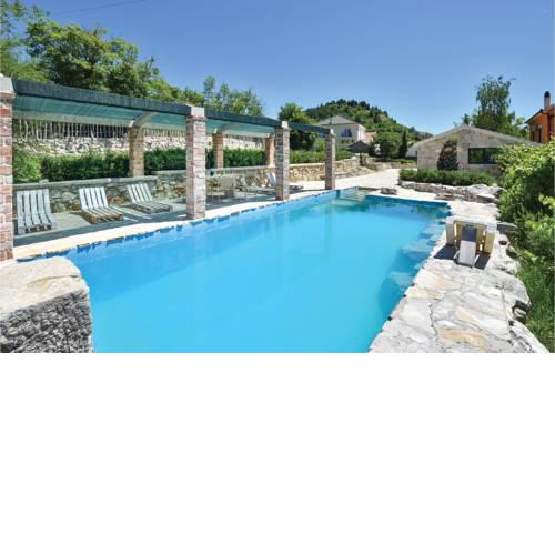 Four-Bedroom Holiday Home in Sinj