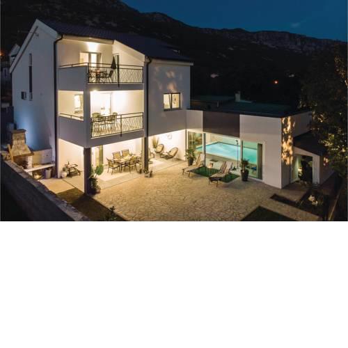 Four-Bedroom Holiday Home in Tribalj