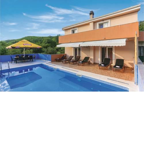 Four-Bedroom Holiday Home in Trnbusi