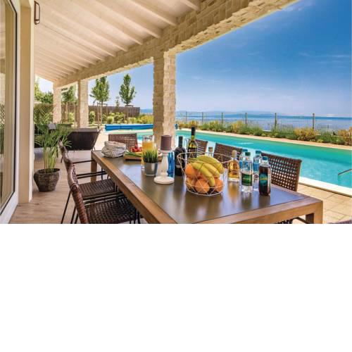 Four-Bedroom Holiday Home in Veprinac