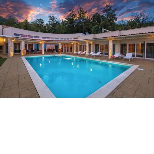 Four-Bedroom Holiday Home in Veprinac